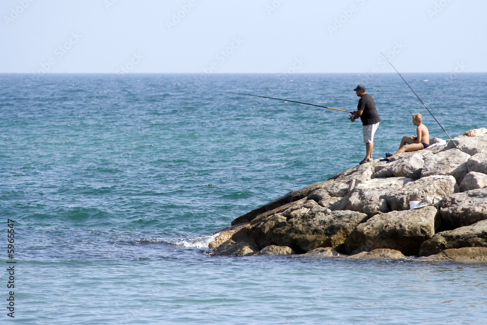 Pêche à la ligne - bord de mer