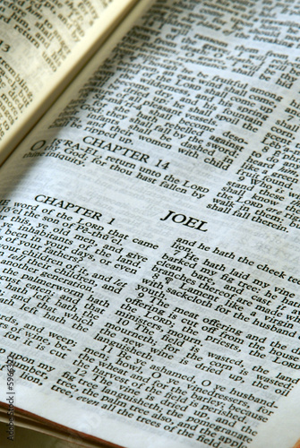 holy bible open to the book of joel in the old testament photo