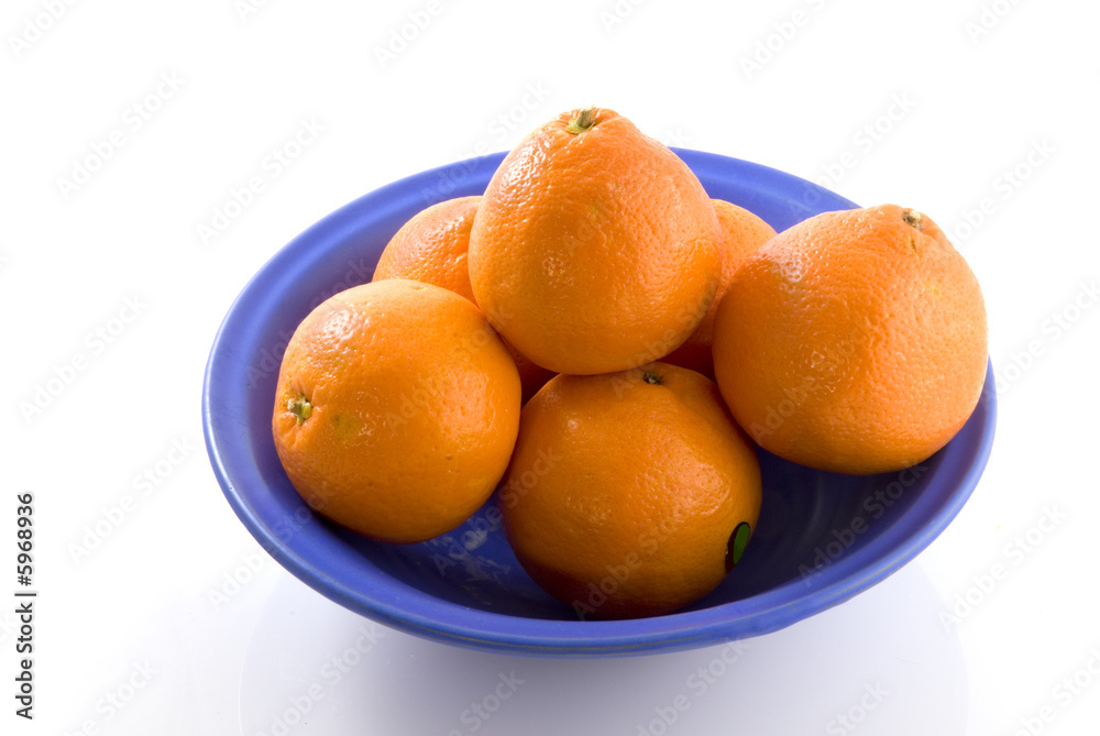 oranges in blue Greek bowl oranges in blue Greek bowl