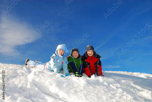 Happy Children Playing in Snow
