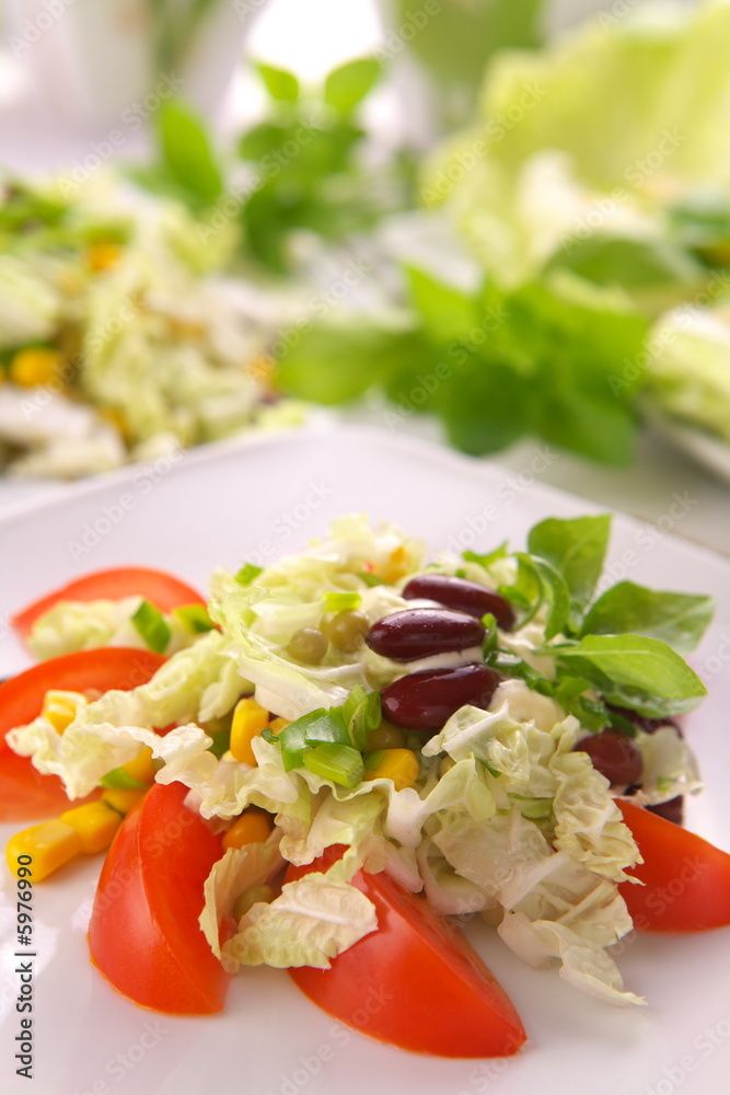 Fresh tomato salad with corn and basil