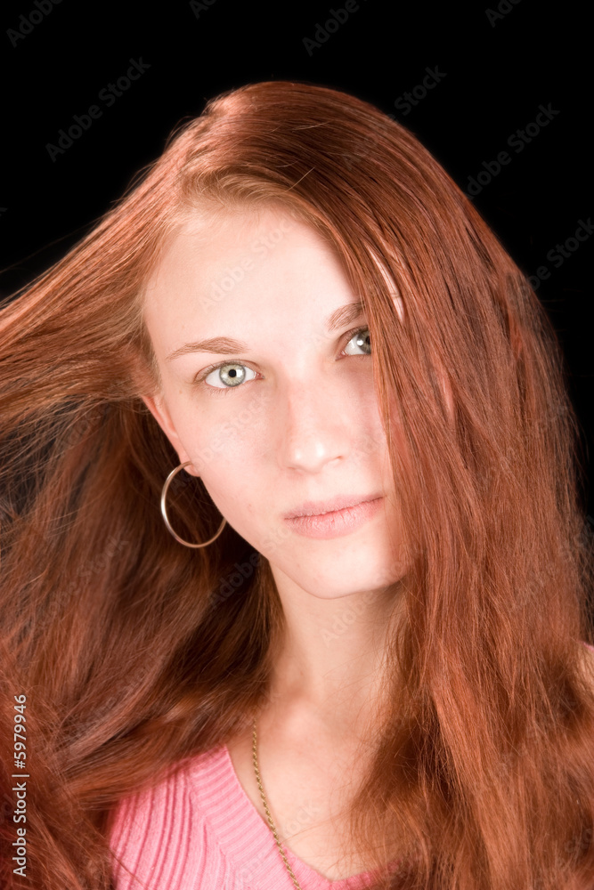 Naklejka premium beautiful redhead with blue eyes, head shot