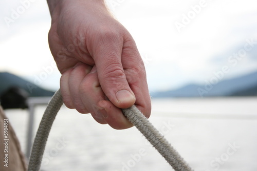 hand and rope