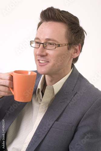 Geschäftsmann lachend mit Kaffee - Businessman with coffee