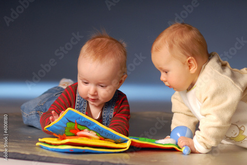 Babies playing with toys