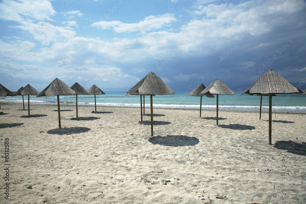group of parasols at christi island near crete