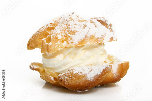 nice polish typical puff cake with cream over white background