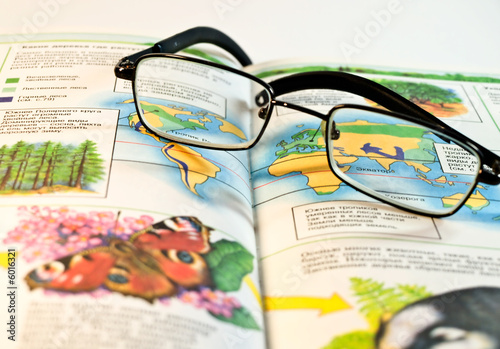 disclosed book and glasses