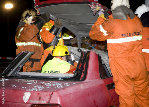 firemen taking off the top