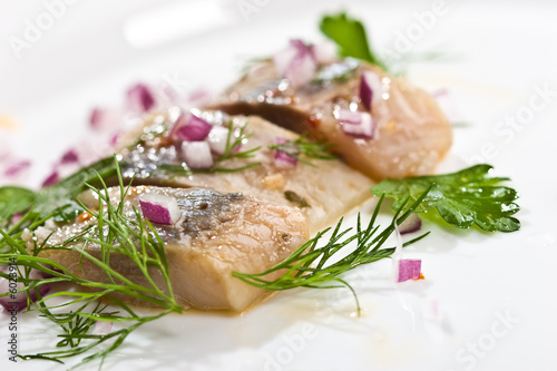 macro picture of herring fillet on the plate