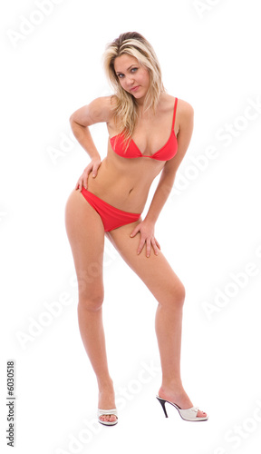 young and beautiful woman with bikini on white background