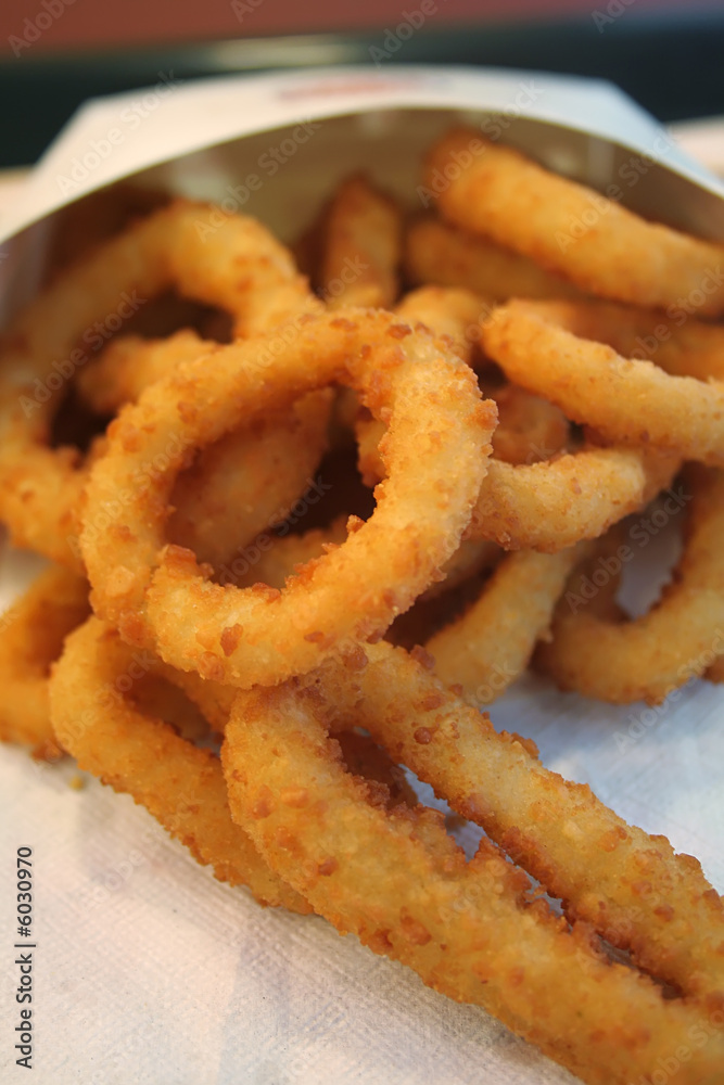 Close up shot of onion rings, the popular fast food snack. Close up shot of onion rings, the popular fast food snack.