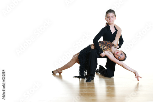 Young dancers isolated on white background photo
