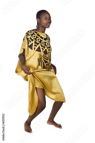 Young African woman traditional dress, dancing