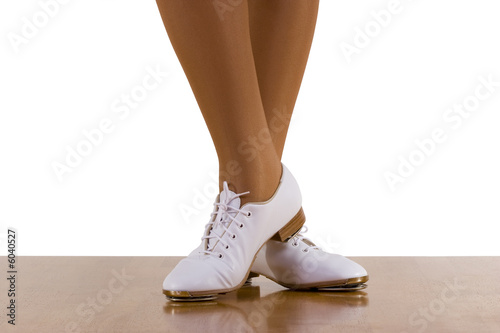 Tap-top/Clog dancer in clogging shoes; on white