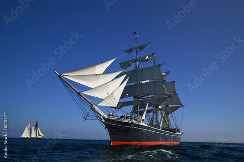 Tall Sailing Ship at Sea under full sail 