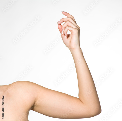 Arm von Frau schnippt mit Fingern photo