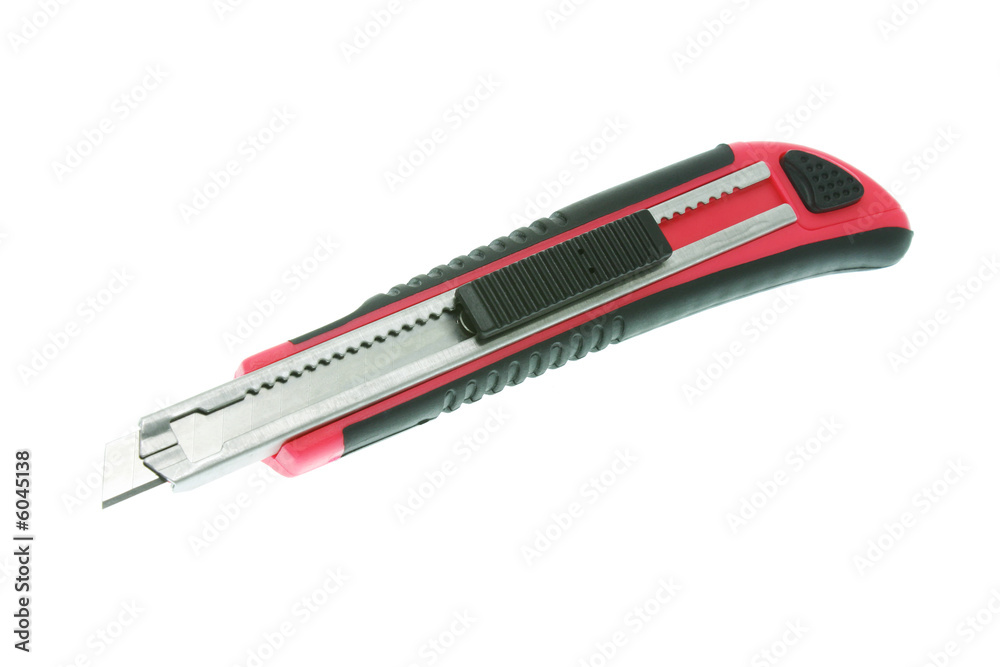 Red utility knife isolated on white background Red utility knife isolated on white background