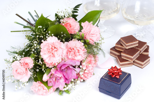 Romantic table with bunch of pink carnations