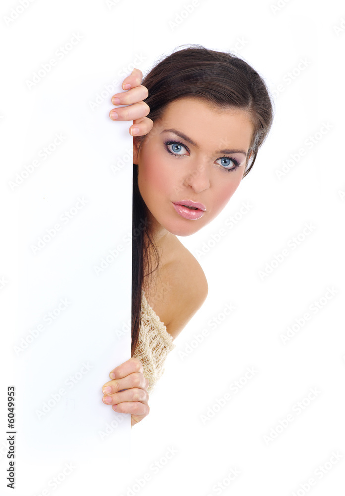 Portrait of a beautiful woman holding a blank billboard. Portrait of a beautiful woman holding a blank billboard.
