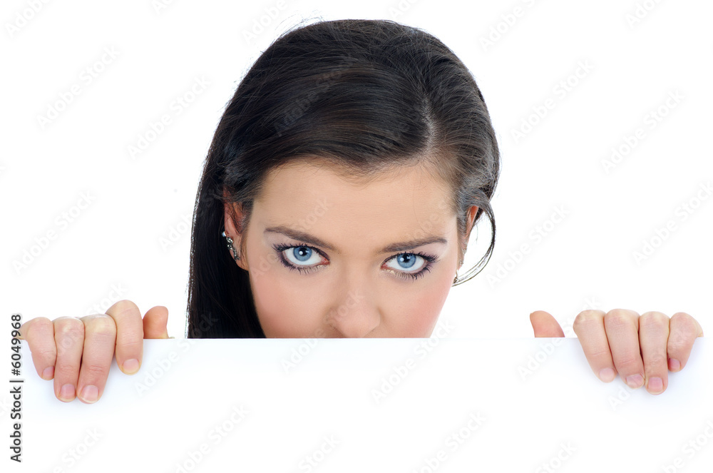 Portrait of a beautiful woman holding a blank billboard. Portrait of a beautiful woman holding a blank billboard.