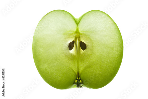 Thin sectional slice of apple showing seeds and structure