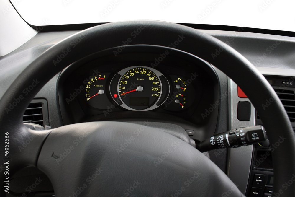 Illuminated dashboard and steering wheel of a modern car