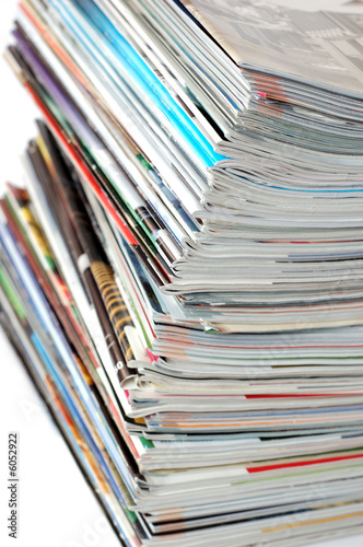 Pile of magazines on white