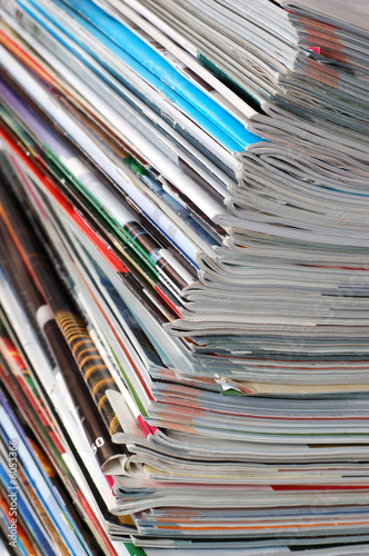 Pile of magazines on white