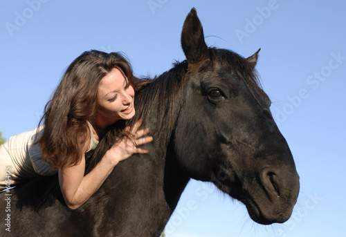 young woman and stallion