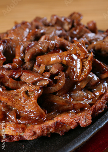 Prepared mushroom with meat and sauce detail