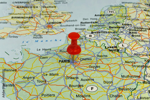Red pin pointing on paris in map