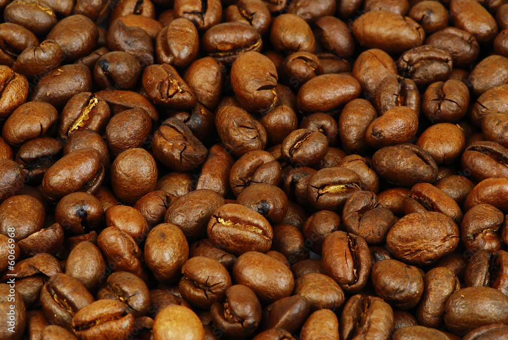 Background of coffee beans with great honey color Background of coffee beans with great honey color
