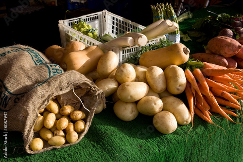 Fresh vegetables on display for sale on a market stall