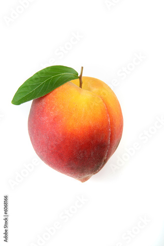 peach on isolated background, with natural leave