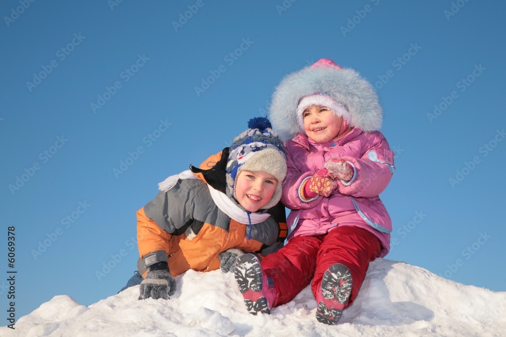 two children on snow hill two children on snow hill