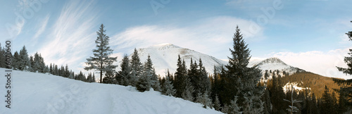 Winter morning mountain landscape with cirrus clouds 