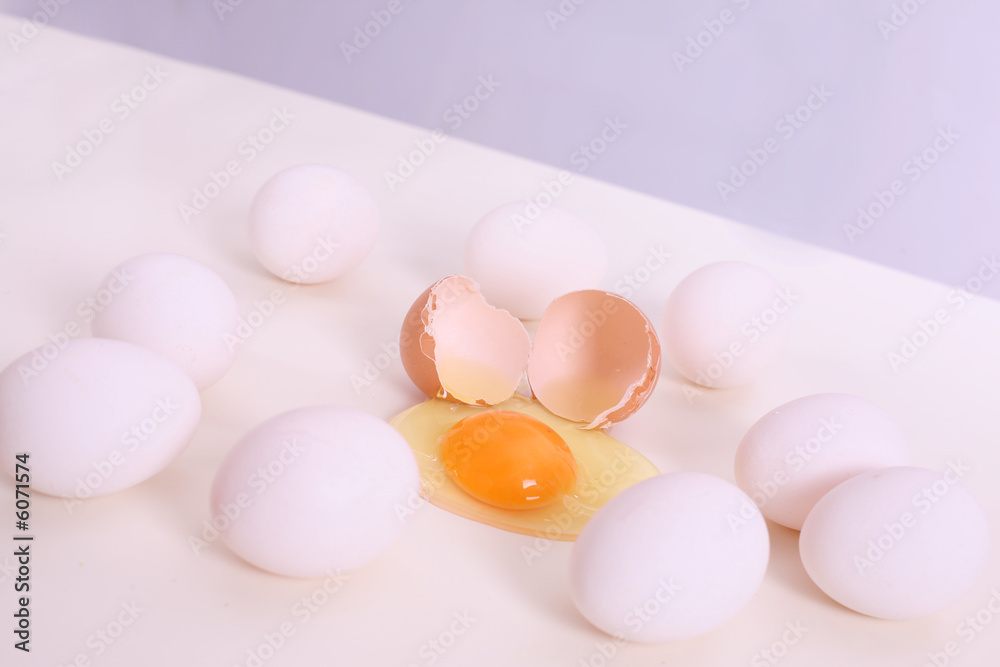 white and brown eggs on the table