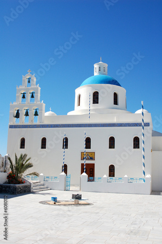 Church with a colorful blue dome in Greece.