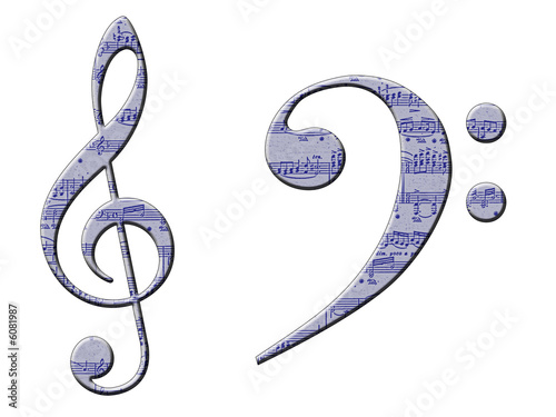 A treble and bass clef with manuscript pattern