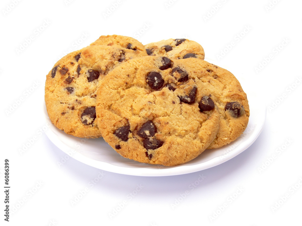 Chocolate chip cookies on a white plate isolated on white Chocolate chip cookies on a white plate isolated on white