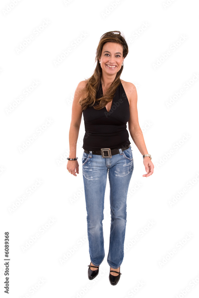 Beautiful woman in jeans walking on white background Beautiful woman in jeans walking on white background