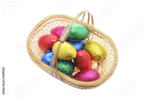 Easter Eggs in Basket on White Background