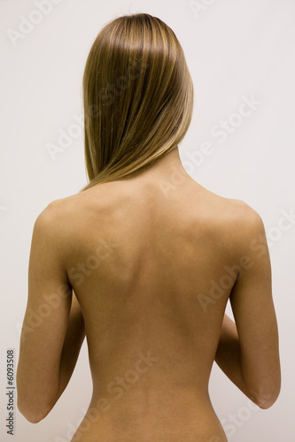 The girl with the naked back and long hair