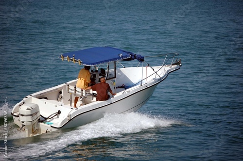 Sport Fishing Boat with Blue Canvas Canopy