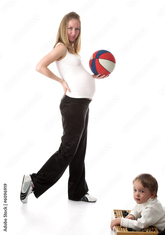 The pregnant woman and ball. A photo on a white background The pregnant woman and ball. A photo on a white background
