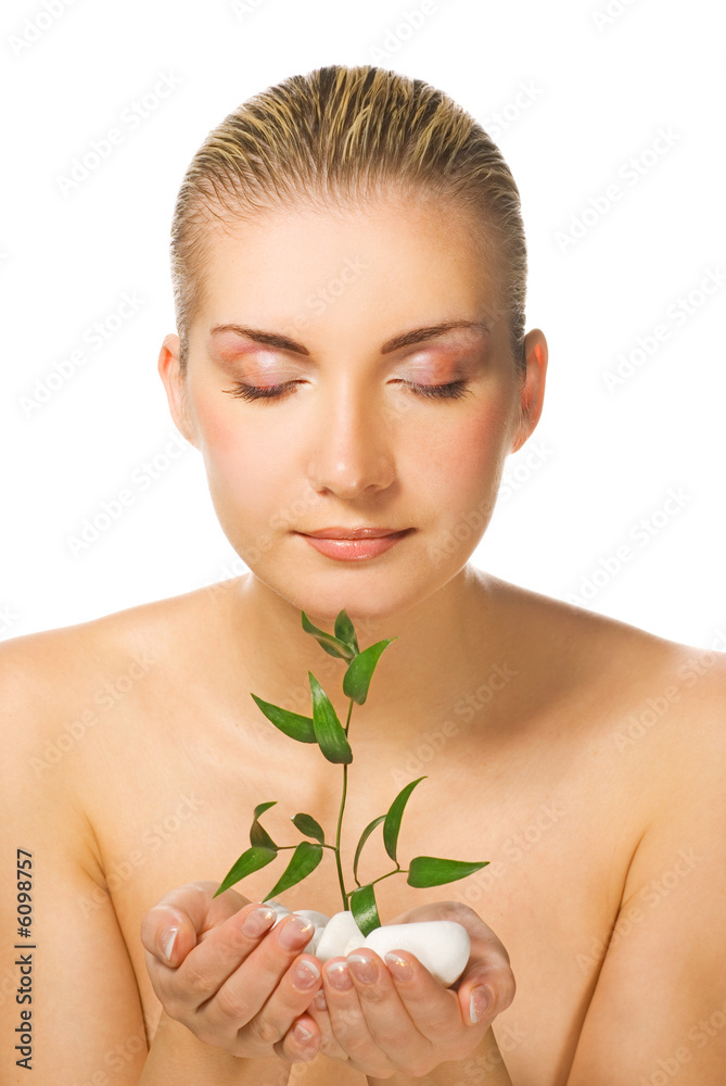 Beautiful blond girl holding young plant Beautiful blond girl holding young plant