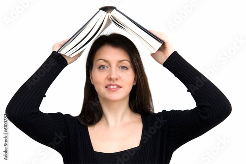 beautiful woman with big book on a white background