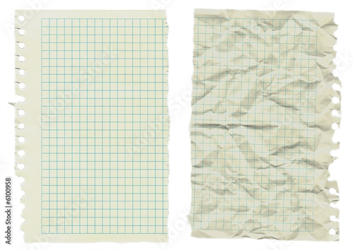 two sheets of old notebook paper isolated on white