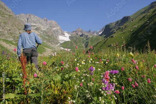 Tourist in mountains in the valley of flowers